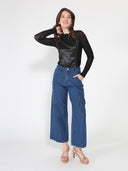 Pearl embellished pleather front mesh sleeve top