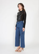 Pearl embellished pleather front mesh sleeve top